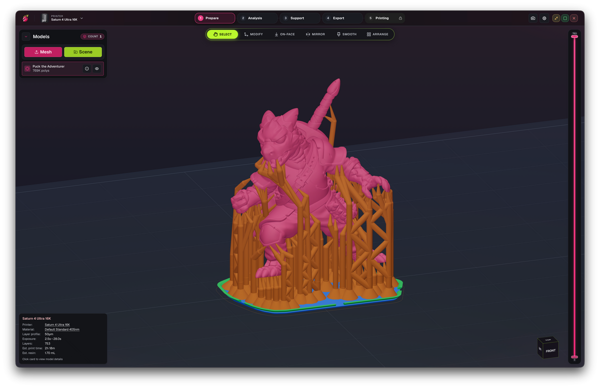 DragonFruit slicer promotional screenshot showing a pink creature miniature with orange resin-printing supports.