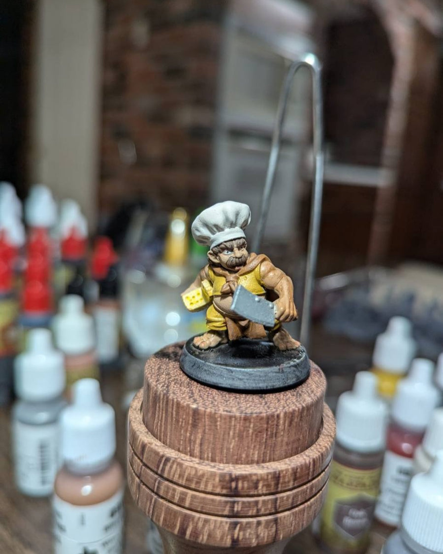 Painted chef miniature from PrintedByAliens, shown as painting inspiration