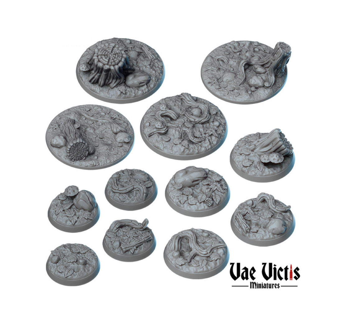 Forest-themed miniature bases in several sizes, shown in a product image