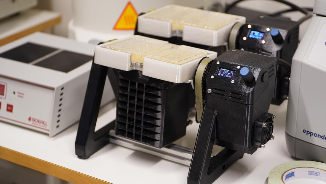 Custom laboratory instruments with 3D-printed frames and digital controls, photographed by Daniel Nilsson.